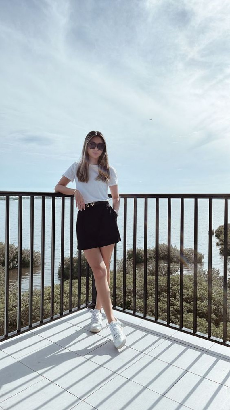 White T-shirt Shorts With Sneakers Fashion Wear With Black Formal Skirt, Photograph: 